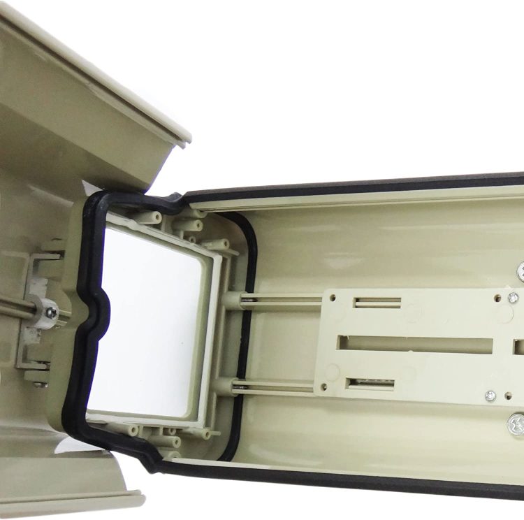 Protect your outdoor camera with Telpix HO-605 housing. Weatherproof, beige, and includes sun shield and lockable clasp. Measures 5.6x4.5x14.5 inches Open Case.