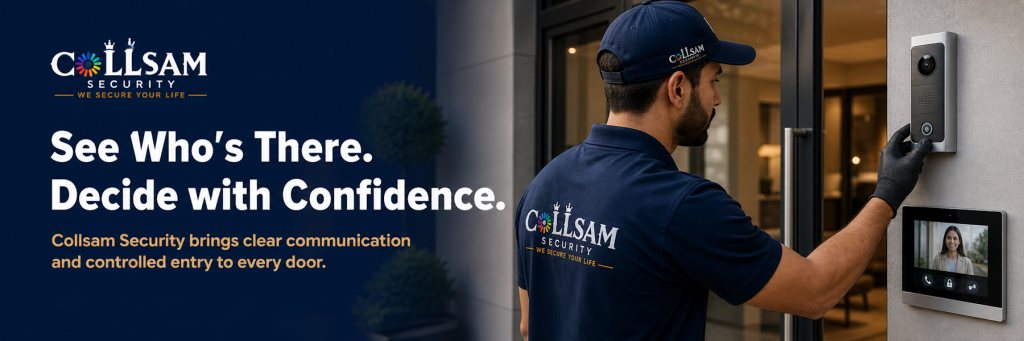 Collsam Security technician installing a video door phone and intercom system at a secure building entrance.